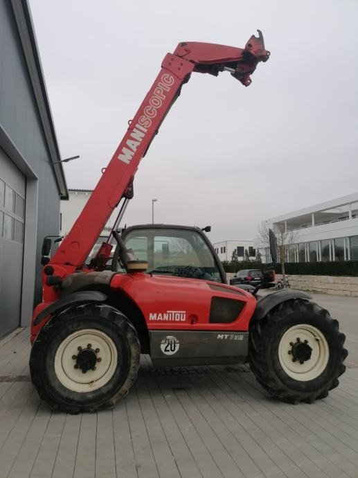 B12EE110.jpg Chargeur télescopique Manitou MT732 – 2003 - 7m – Image 1